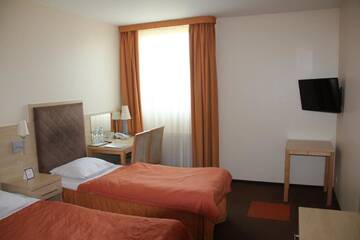 Фото номера Двухместный номер с 1 кроватью или 2 отдельными кроватями Отель Hotel Orange Przeźmierowo г. Пжезмерово 2